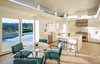 A newly remodeled kitchen boasts Wolf appliances and an eat-in breakfast island off the pool Photo 4 of Hillcrest Road modern home