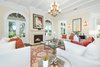 Dual great rooms showcase inlaid walnut floors, coffered ceilings and French doors to the outdoor spaces for a seamless indoor-outdoor connection. Photo 3 of Benedict Canyon Villa modern home