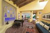 Elegant Moroccan details and hand-laid brick elevate the living spaces. Photo 2 of Malibu Colony Road modern home