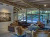 The home's walls of glass bring the swimming pool and attractive landscaping to the forefront of the living experience. Photo 7 of Midcentury Post and Beam In Fryman Canyon modern home