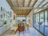 Terrazzo floors in the open dining room provide modernize the space Photo 9 of Midcentury Post and Beam In Fryman Canyon modern home