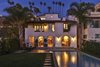 Modern home with Outdoor. The home's classic Spanish archways and expansive pool take on an enchanting twilight glow. Photo of A Santa Monica Beach House Built for Norma Talmadge