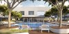 Modern home with Outdoor and Large Pools, Tubs, Shower. The outdoor pool features a sundeck, private, shaded daybeds, and indoor/outdoor lounge. Photo 7 of The Residences at The Sawyer