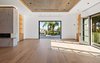 A refined master suite showcases marble fire features, LED light strips, dual bathrooms and showroom closets. Vanishing pocket doors lead to a voluminous terrace overlooking the grounds. Photo 9 of Architecturally Inspired Living in Beverly Hills modern home