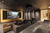 A plush cinema in the lower entertainer's level. Photo 12 of Architecturally Inspired Living in Beverly Hills modern home