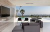 Automatic Fleetwood pocket doors bring stunning views of Downtown and the ocean to the forefront of the living experience. Photo 3 of A Showpiece on Shadow Hill modern home