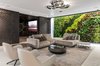 A stunning living green wall adds a burst of color to the home's expansive lower entertainer's level. Photo 8 of A Showpiece on Shadow Hill modern home