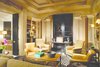 Artfully designed, the library includes lightened Georgia Sugar Pine Millwork and serves as a convenient screening room. Photo 2 of A Wallace Neff Inspired Masterpiece in Desert Highlands modern home