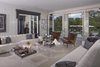 Modern home with Living Room. Floor-to-ceiling pocket doors throughout the main level’s living spaces create a seamless indoor-outdoor flow to lush grounds. Photo 3 of Old Hollywood Glamour With Modern Appeal in Bel Air