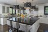 Modern home with Kitchen. A gourmet chef’s kitchen is equipped with VIking, Sub-Zero, and Bosch appliances, while a smaller caterer’s kitchen services both formal and informal dining rooms. Photo 4 of Old Hollywood Glamour With Modern Appeal in Bel Air