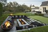 Modern home with Outdoor. A lounge area with fire features overlooks the home's private putting green. Photo 8 of Old Hollywood Glamour With Modern Appeal in Bel Air
