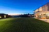 Modern home with Outdoor, Grass, Back Yard, Large Patio, Porch, Deck, Shrubs, and Gardens. An expansive lawn rarely seen in the hills.
Photo 10 of An Architectural Gem on the Bird Streets of Los Angeles