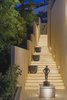 Modern home with Staircase. The elegantly lit, entry passage way leads to the main living level. Photo 2 of Modern Mexican Retreat Casa Grillo Stuns From An Ocean-View Hillside