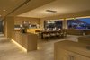 Modern home with Dining Room. The sprawling, open-plan living and dining area. Photo 4 of Modern Mexican Retreat Casa Grillo Stuns From An Ocean-View Hillside