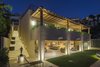Incandescent, ambient and accent lighting sets the mood, both inside and out. Photo 9 of Modern Mexican Retreat Casa Grillo Stuns From An Ocean-View Hillside modern home