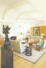 Modern home with Living Room. The home's curved roof serves accentuates the volume of the living spaces while highlighting available western-facing views. Photo 3 of A Michael Palladino-Designed Modernist Estate in California’s Santa Ynez Valley