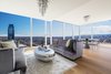 Modern home with Living Room. The first-floor great room in a three-bedroom, corner penthouse atop Tower I at Metropolis. Photo of Two-Story Penthouses Atop Metropolis Bring All of Los Angeles Into View