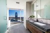 Modern home with Bath Room. Bathrooms feature dual vanities, glass showers, Waterworks, Hansgrohe and Toto features. Photo 4 of Two-Story Penthouses Atop Metropolis Bring All of Los Angeles Into View