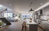 The great room in a penthouse residence, with stairs leading to the rooftop terrace, capturing views of the Downtown Los Angeles skyline. Photo 2 of Vica Brings Contemporary Living to One of L.A.’s Most Historic Neighborhoods modern home