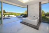 The master suite features an oversized Italian marble bath with dual sitting areas and a massive terrace with a spa, lounge area, fire pit and views.
Photo 7 of An Architectural Masterpiece Shines Above the Bel Air Golf Course modern home