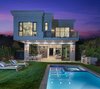 Lined with manicured hedges, the backyard is a peaceful retreat, complete with a large, grassy lawn, built-in barbecue, pool, spa and cabana. Photo 10 of A Newly Built Architectural Estate Dazzles in L.A.’s Beverly Grove modern home