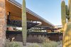 Modern home with Exterior and House Building Type. South patio/Shade layers Photo 6 of Saguaro Ridge/Orem Residence