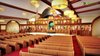 Modern home with Living Room, Sofa, Floor Lighting, Bench, Wall Lighting, Ceiling Lighting, Table Lighting, Pendant Lighting, Medium Hardwood Floor, Standard Layout Fireplace, Light Hardwood Floor, and Concrete Floor. Church Auditorium Design View Photo of Magnificent 3D Church Auditorium Design View