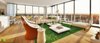 Modern home with Living Room, Bench, Chair, Sofa, Coffee Tables, Ceiling Lighting, Wall Lighting, Medium Hardwood Floor, Console Tables, Light Hardwood Floor, Table Lighting, and Standard Layout Fireplace. Elegant Contemporary Living Room Design View Photo of Dramatic Classic Living Room Idea