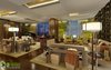 Modern home with Living Room, Chair, Sofa, Table, Desk, Stools, Lamps, Media Cabinet, End Tables, Shelves, Console Tables, Ceiling Lighting, Table Lighting, Coffee Tables, Wall Lighting, Medium Hardwood Floor, Dark Hardwood Floor, and Standard Layout Fireplace. Yantram Interior Design Studio shares ideas, inspirations, life style and all-round creative ingenuity with the world via this photorealistic residential living room design render. Photo 4 of Dramatic Classic Living Room Idea