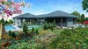 Modern home with Outdoor, Back Yard, Trees, Gardens, Flowers, Garden, Grass, Small Pools, Tubs, Shower, Large Patio, Porch, Deck, Wood Fences, Wall, Landscape Lighting, Swimming Pools, Tubs, Shower, and Small Patio, Porch, Deck. Landscape view of Vila Photo of Dreamy Modern House Rendering Ideas by Yantram Exterior Rendering Services - Sydney, Australia