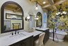 incorporated the arched window into the mirror frame design Photo 5 of Tuscan Retreat modern home