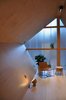 Modern home with Living Room, Chair, Light Hardwood Floor, and Ceiling Lighting. Loft Space Photo 4 of Lighthus