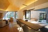 Modern home with Dining Room, Chair, Accent Lighting, Medium Hardwood Floor, and Pendant Lighting. Dining Space & Family Room Photo 7 of Lighthus
