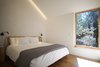 Modern home with Bedroom, Accent Lighting, Medium Hardwood Floor, Wall Lighting, and Bed. Master Bedroom in the morning. Photo 9 of Lighthus
