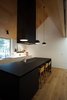 Modern home with Pendant Lighting, Ceiling Lighting, and Medium Hardwood Floor. Kitchen Photo 11 of Lighthus