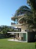 Modern home with Outdoor, Garden, Gardens, Swimming Pools, Tubs, Shower, Concrete Patio, Porch, Deck, and Front Yard. Master Bedroom and Guest Bedroom ensamble Photo 2 of La Caracola Beach House