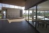 Modern home with Outdoor, Wood Patio, Porch, Deck, and Field. Terrace Level 3, Dinning-Living and Entry to the Master Bedroom Photo 10 of La Caracola Beach House