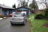 Modern home with Exterior, House Building Type, Wood Siding Material, and Gable RoofLine. Before photo illustrates the extend of the change. Photo 4 of Massive Addition does not over-whelm