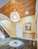 Modern home with Staircase, Wood Tread, and Wood Railing. New entry Photo 5 of Massive Addition does not over-whelm