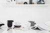 View of the Living room table accessories & library with architecture books Photo 9 of S|H Apartment modern home