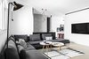 Modern home with Living Room, Chair, Sofa, End Tables, Coffee Tables, Ceiling Lighting, Floor Lighting, Wall Lighting, and Light Hardwood Floor. Living Room Photo 2 of A|A Duplex