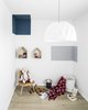 Modern home with Chair and Light Hardwood Floor. Kids Room Photo 13 of A|A Duplex