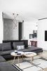 Modern home with Living Room, Bench, Chair, Floor Lighting, Light Hardwood Floor, Sofa, and Ceiling Lighting. Living Room Photo 3 of A|A Duplex