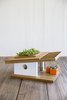 "Sunset Modern" birdhouse designed by Douglas Barnhard. This Eichler inspired birdhouse is made with bamboo and teak with orange and white laminate. Removable planter box and roof for succulents. Photo of 13 Great Modern Birdhouses modern home