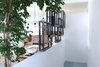 Modern home with Staircase, Wood Tread, and Metal Railing. Stairway Photo 13 of A house in the mountains