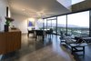 Modern home with Dining Room, Table, Pendant Lighting, Chair, Storage, Recessed Lighting, and Concrete Floor. dining room - looking out to wasatch mountains Photo 7 of Governors Plaza