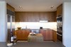 Modern home with Kitchen, Wood Cabinet, Concrete Floor, Engineered Quartz Counter, Glass Tile Backsplashe, Accent Lighting, Recessed Lighting, Refrigerator, Wall Oven, Cooktops, Undermount Sink, and Dishwasher. kitchen with butcher block Photo 8 of Governors Plaza