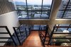 Modern home with Staircase, Wood Tread, and Metal Railing. staircase - looking to salt lake valley beyond Photo 11 of Governors Plaza
