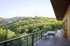 Modern home with Outdoor, Back Yard, Horizontal Fences, Wall, Metal Fences, Wall, Large Patio, Porch, Deck, Decking Patio, Porch, Deck, and Wire Fences, Wall. The viewing deck overlooks a canyon that's also home to beaver, moose, elk, deer, and bobcats. Photo 10 of Red Hawk