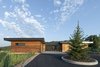 Modern home with Exterior, Metal Roof Material, House Building Type, Wood Siding Material, Flat RoofLine, and Shed RoofLine. The east facade reflects a serene late summer morning. Photo 12 of Red Hawk